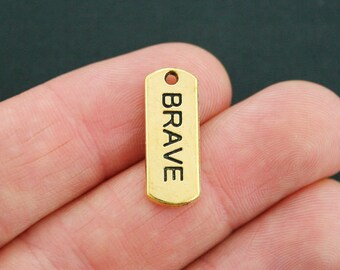 8 Brave Charms Antique Gold Tone - GC642