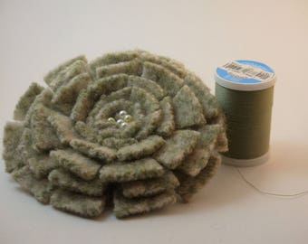 Green patterned felt flower brooch with beaded center