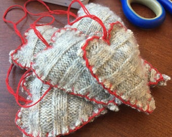 Cable knit heart tree ornaments.