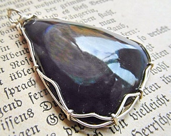 Rainbow Obsidian in silver wirework Arco Iris