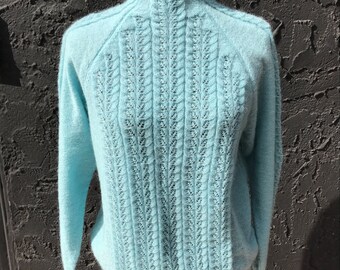 A gentle turquoise pullover