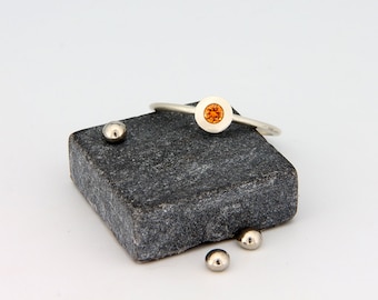 14k White Gold Orange Sapphire Ring | Handmade solid 14k white gold ring set with brilliant cut orange sapphire