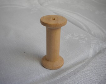 large raw wooden reel spool model