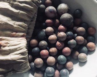 Marbles, clay Antique marbles, Antique game pieces.
