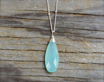 Aqua blue chalcedony necklace. Sterling silver blue chalcedony briolette necklace on a bead chain. Facate chalcedony teardrop pendant.