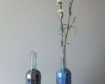 Pair of mosaic flower bottles