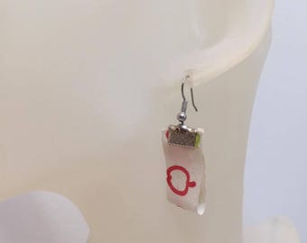 Ribbon earrings Apple on white background