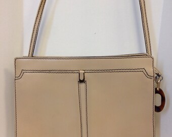 small cream shoulder bag