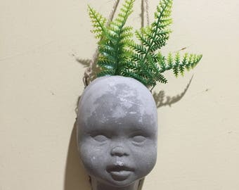 Unique, eclectic dolls head vases - a must see!