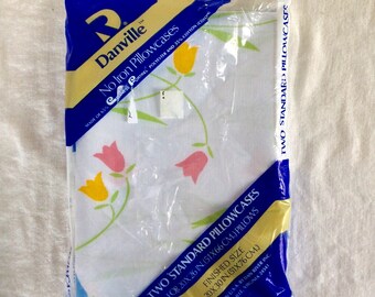 Two vintage standard pillowcases / new in plastic / danville