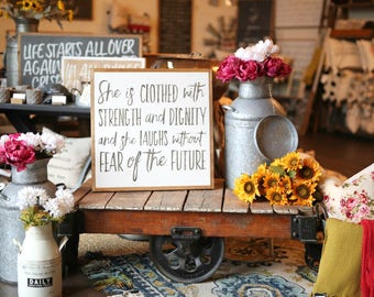 2'X2' She Is Clothed With Strength And Dignity And She Laughs Without Fear Of The Future Framed Wood Sign