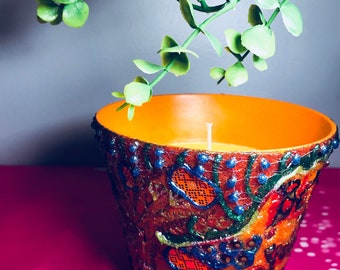 Customized citronella candles.