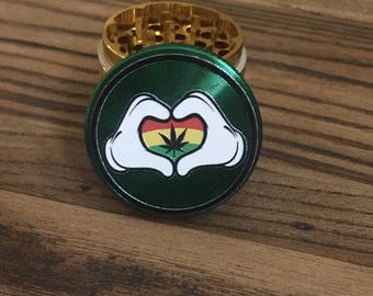 Rasta Hands of Love 44mn 4 part full color aluminum custom herb grinder.