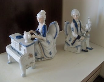 mr and mrs fancy high society musicians figurines