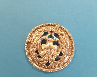 Large silver button marked Birmingham England.