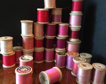 Vintage Wooden Spools of Sew Thread in shades of red. 30 wooden spools of thread, Lot of 30 Spools of Sewing Thread in reds and pinks.