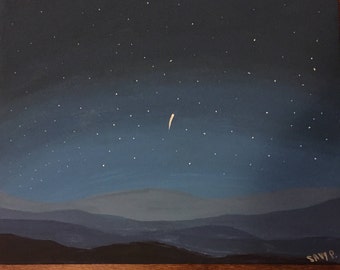 Starry night sky with mountains