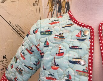 Quilted baby jacket, sail boat print