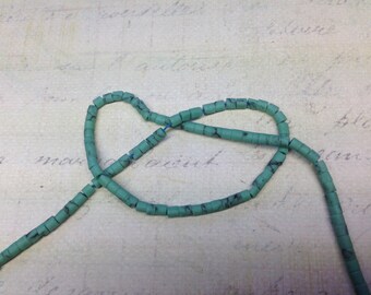 Wire 30 cm (+ 130 units) 1 turquoise heishi beads, 75 x 0, 5mm