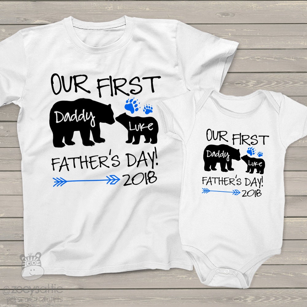 father and infant matching shirts