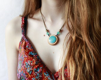 Necklace made of wood and platform turquoise ring