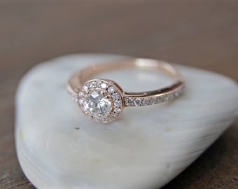 Diamond halo engagement ring in 14k rose gold .45ct