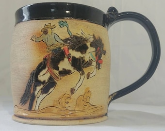 Cowboy and Bronc coffee or tea mug stoneware pottery