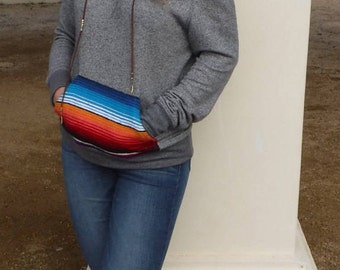 Off the shoulder sweater with serape pocket