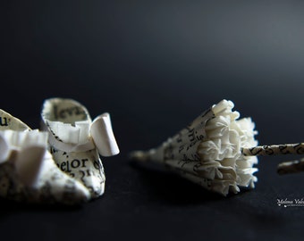 A Pair of Tiny Paper shoes and a Tiny Umbrella