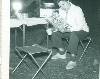 1958 Camp Woman Reading Household Magazine by Lantern Camping 50s Vintage Photograph Black White Photo