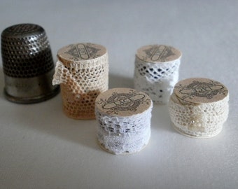 Four Miniature Spools Of Cotton Lace