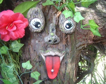 Tree Faces outdoor garden decorations, garden ornaments, sculptures, studded tongue, statues. Great gifts for all gardeners, funny faces.