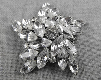 Rhinestone Navette Swirling Star Brooch Unsigned Eisenberg?