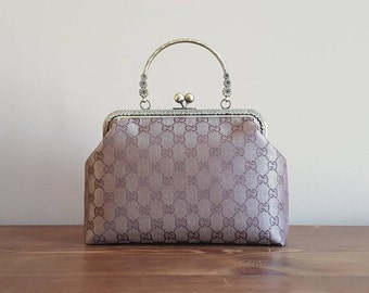 Gucci canvas kisslock bag with handle / crossbody bag
