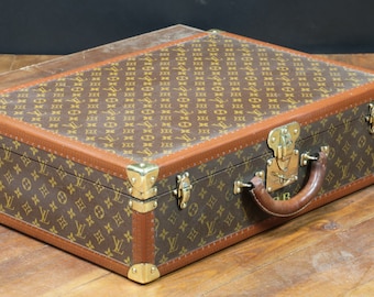 Louis Vuitton suitcase with key