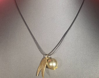 Golden Snitch inspired necklace with black waxed cord