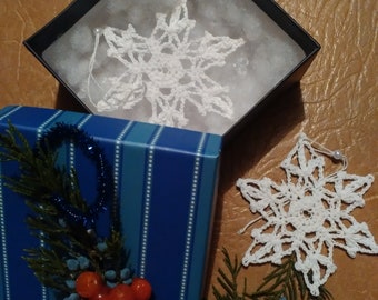 a crocheted decoration of your home merry Christmas white snow handmade