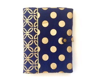 Quilted in matching cotton health booklet