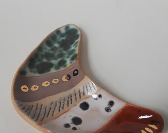 small gold luster boomerang dish