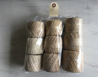 A Vintage Lot of 9 Beige Crochet Cotton Spools