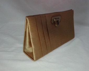 Exclusive handmade raw silk clutch bag.