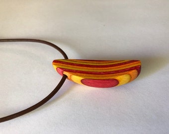 Handcrafted canoe necklace