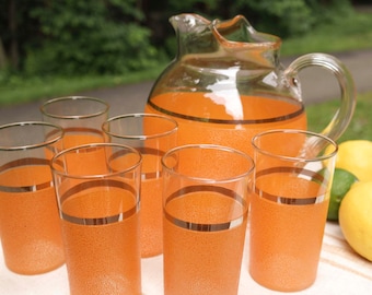 Vintage Clear and Orange Glass Drink Pitcher and Set of 6 Glasses for summer parties