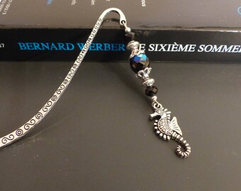Black silver metal bookmark and a seahorse