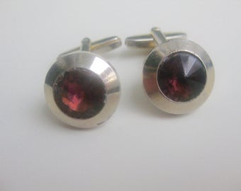 old, Ruby-colored glass cufflinks