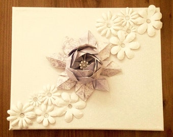 Origami lotus flower on a canvas