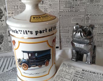 Vintage Mack Truck Hood ornament and Wild Turkey Decanter set