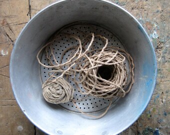 A large, vintage, French colander, aluminum strainer, passoire, vintage kitchen utensils, French kitchen