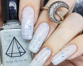 Icy-cool - a white polish with blue shimmer and blue flakies uk indie nail varnish
