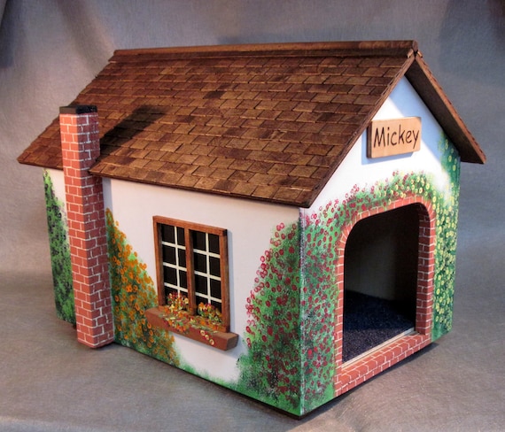 Cat cottage with wood tiled roof